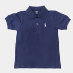 Child wearing a navy blue polo shirt with a logo on a white background