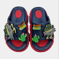 Pair of children's sandals with cartoon characters on a light gray background