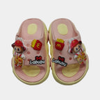 Pink children's sandals with cartoon characters and McDonald's logos on a gray background