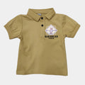Beige polo shirt with a graphic design on a white background