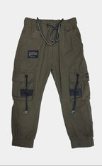 Green cargo pants with multiple pockets on a white background