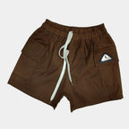 Brown shorts with a white drawstring on a light gray background