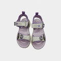 Pair of purple and beige sandals on a light gray background