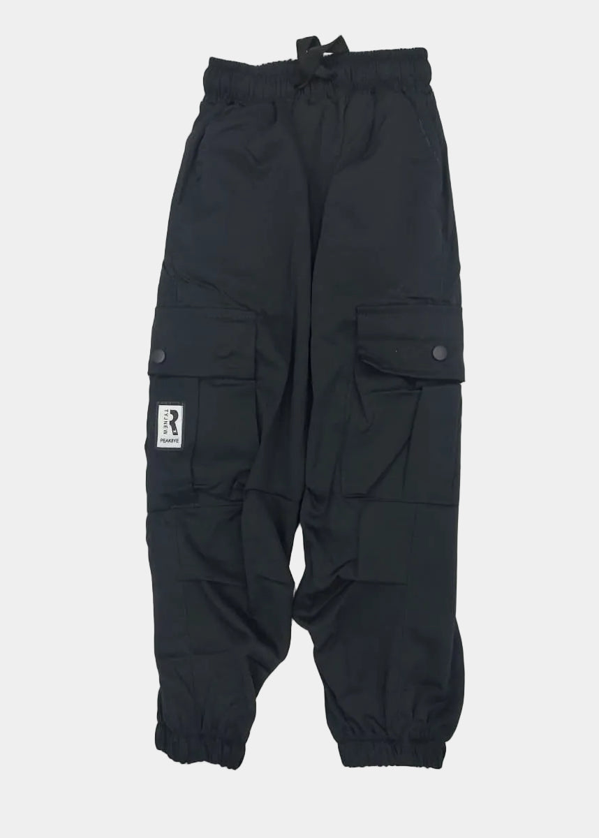 Black pants with a brand logo on a light gray background