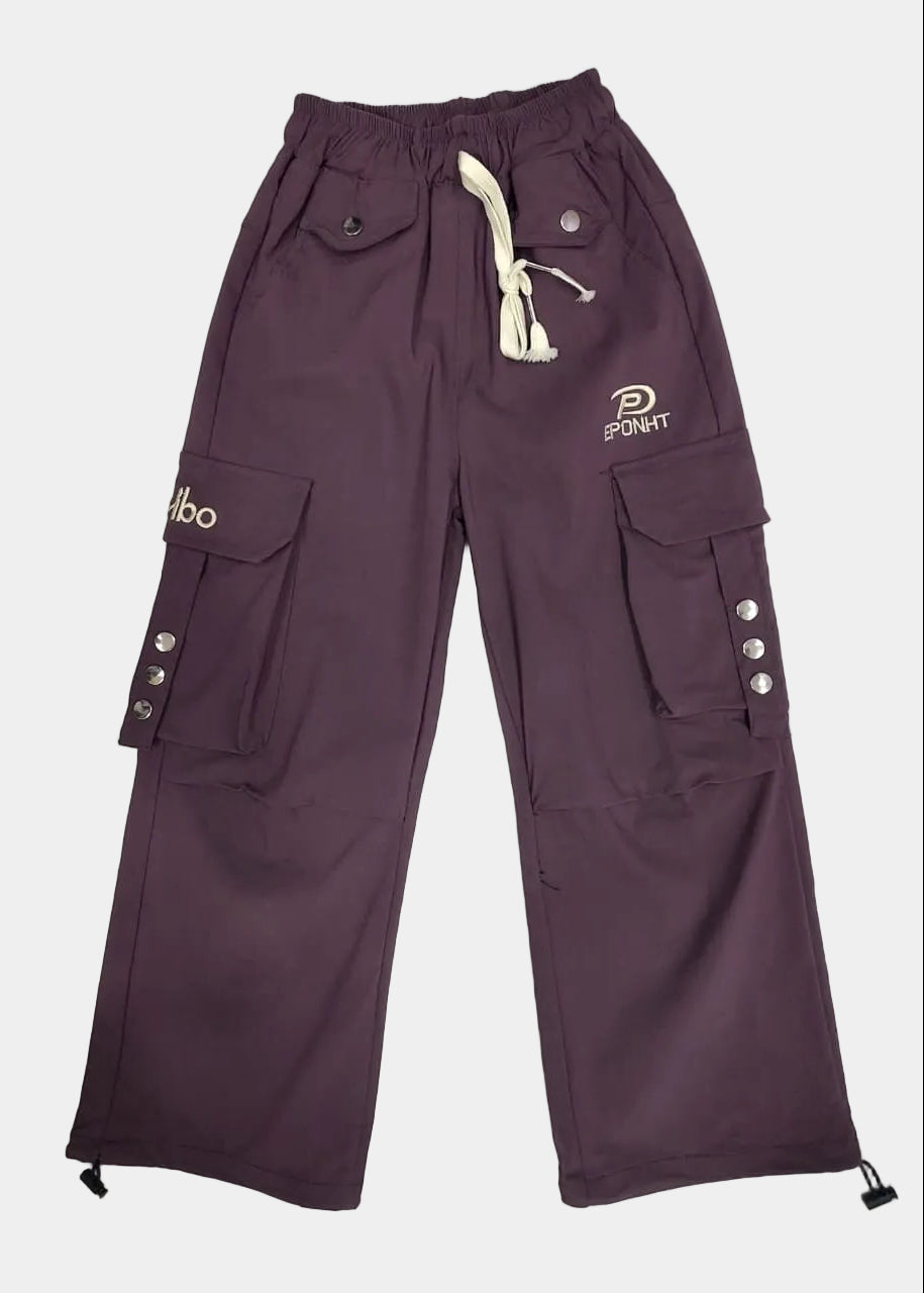 Purple pants with brand logos on a light gray background