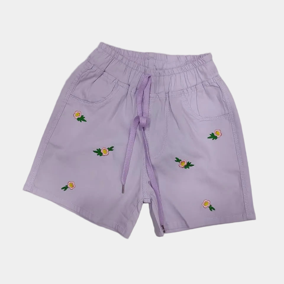 Purple shorts with floral embroidery on a white background