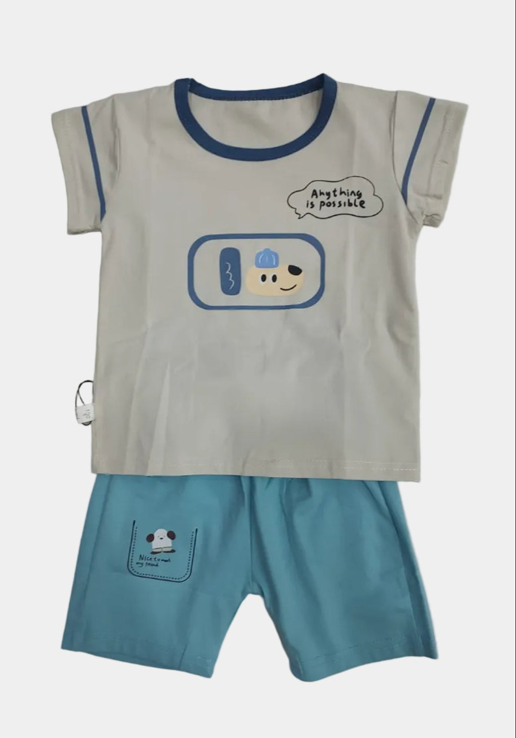 Children's outfit with cartoon design on a plain background