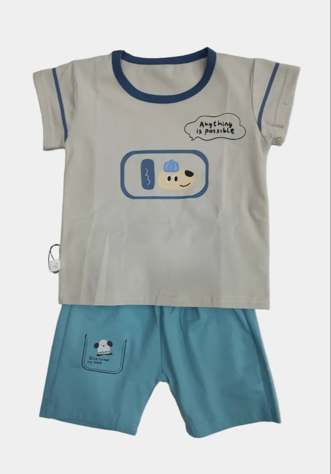 Children's outfit with cartoon design on a plain background
