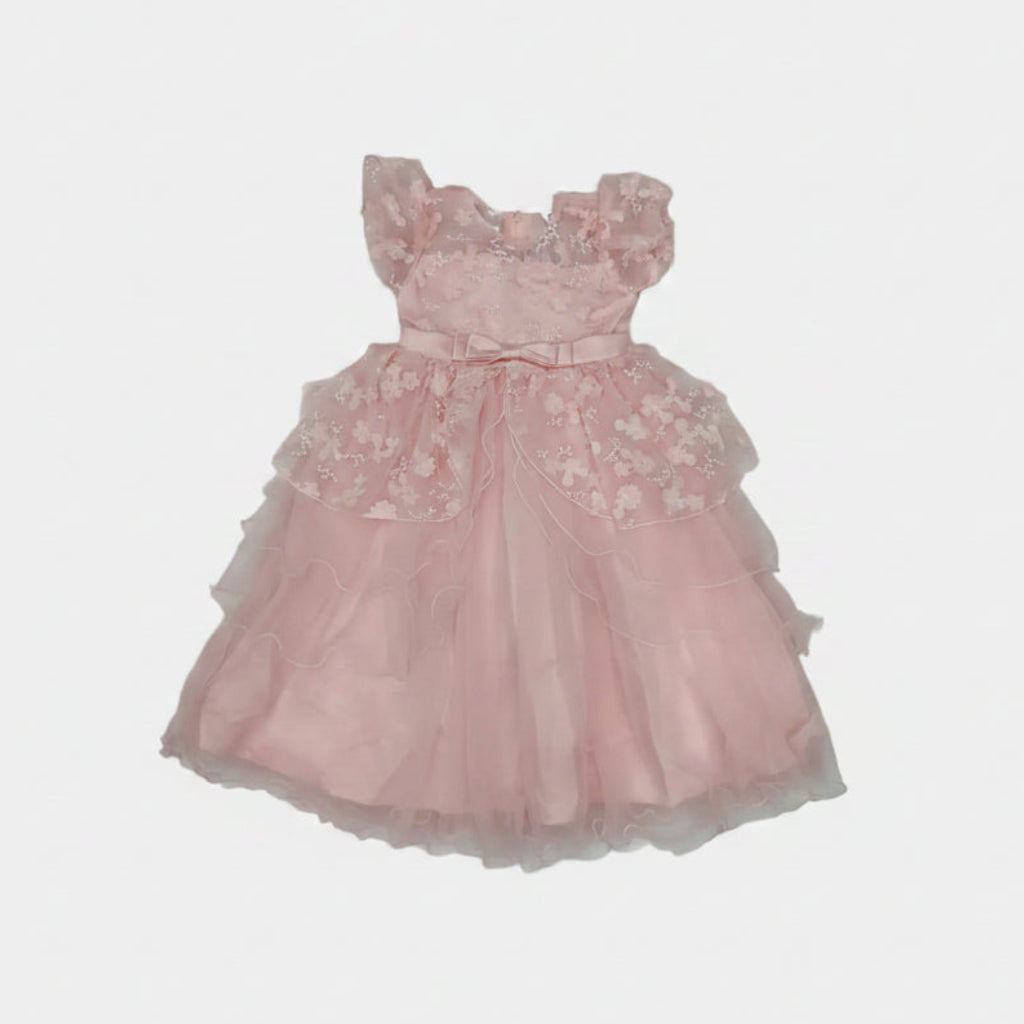 Pink lace dress on a light gray background