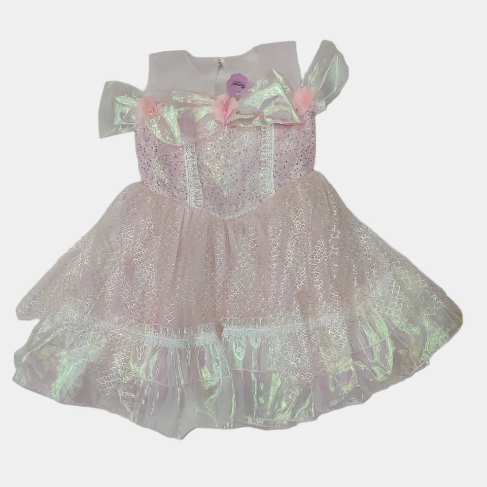 Pink sequined dress with a bow on a white background