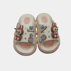 Pair of children's sandals with cartoon character design on a light gray background