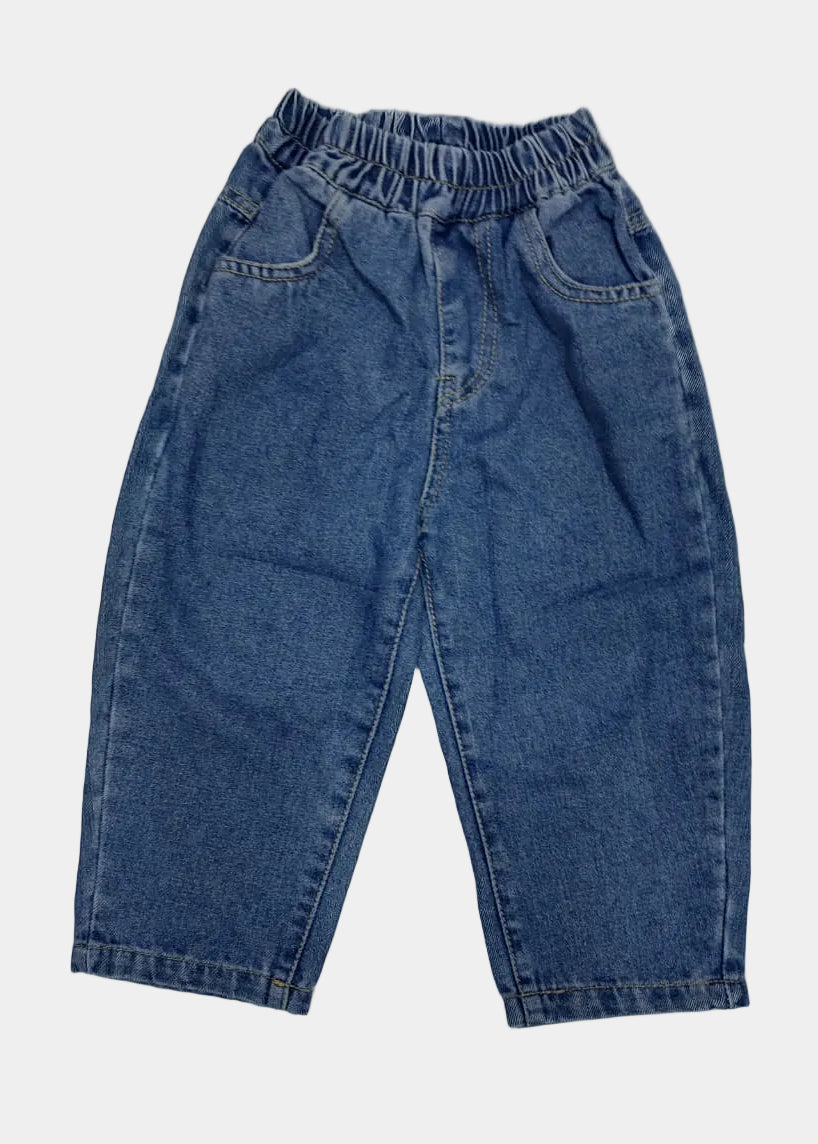 Blue jeans on a white surface