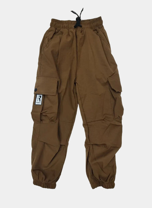 Brown pants with a brand label on a light gray background