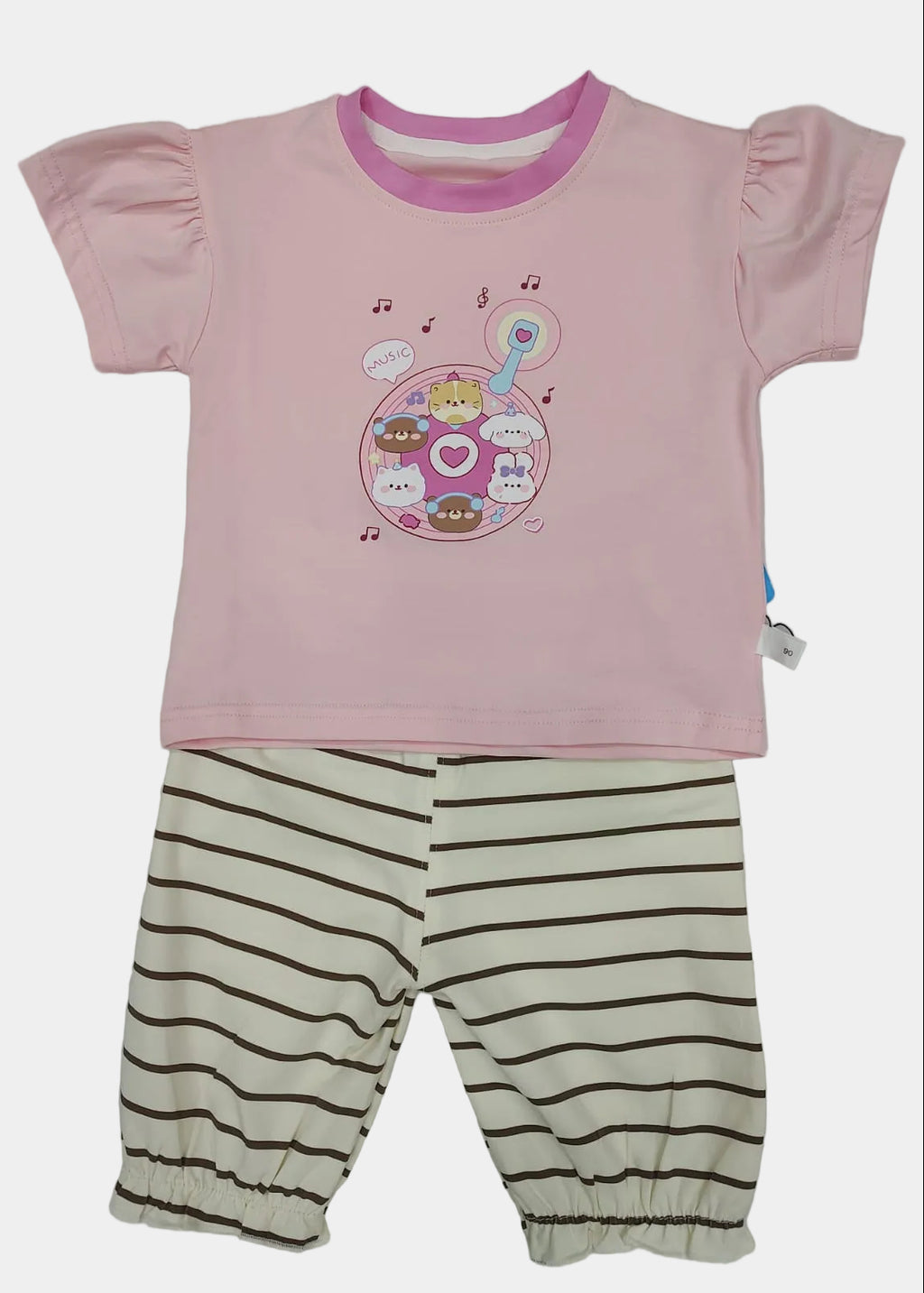 Pink top with cartoon design and striped pants on a white background