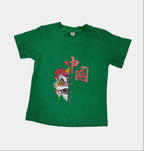Green t-shirt with colorful graphic design on a white background