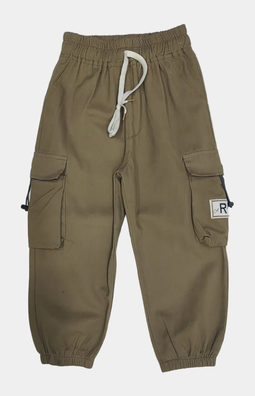 Beige cargo pants with multiple pockets and a drawstring on a white background