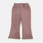 Pink pants with frayed hem on a white background