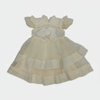 Cream-colored dress with a bow on a white background