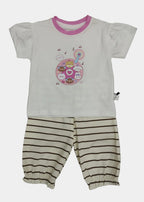 Children's outfit with a white shirt and striped pants on a light gray background