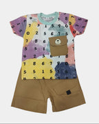 Colorful t-shirt with number patterns and brown shorts on a white background