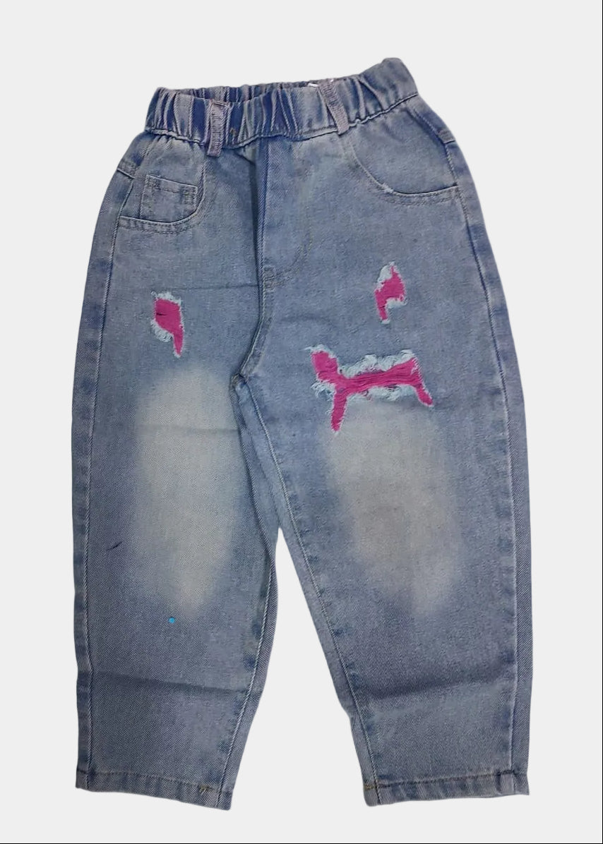 Distressed blue jeans with pink designs on a white background