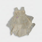 White lace garment on a tiled floor