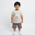 Children's outfit with t-shirt and shorts featuring bear designs on a light gray background