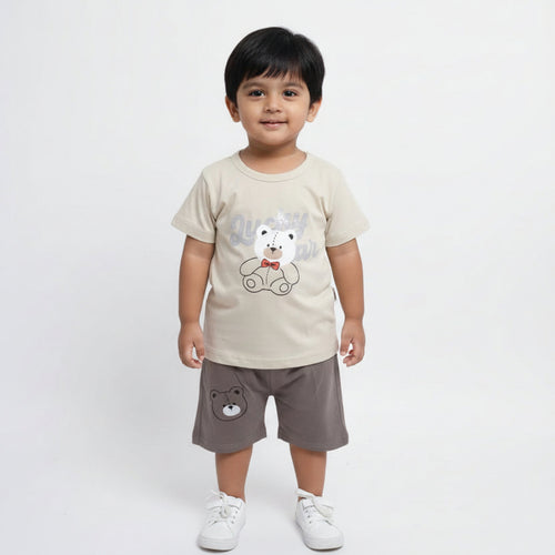 Children's outfit with t-shirt and shorts featuring bear designs on a light gray background