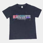 Black t-shirt with colorful text on a white background