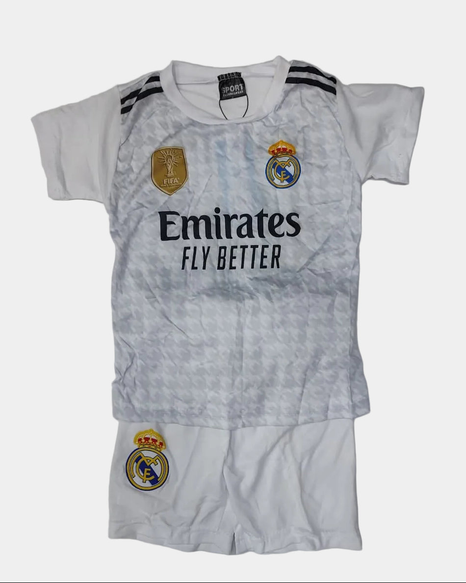 Real Madrid jersey with Emirates logo on a light gray background