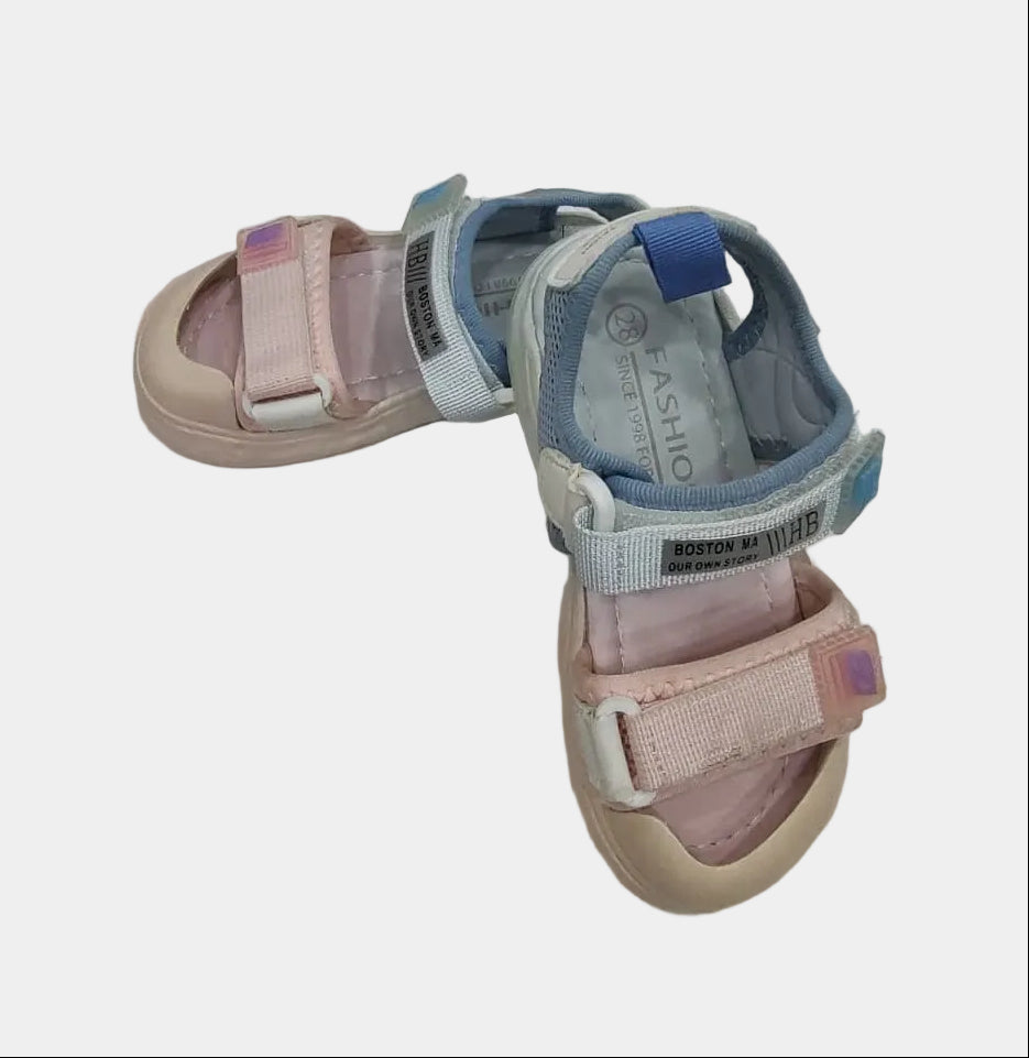 Pair of children's sandals on a light gray background