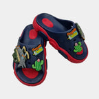 Navy blue and red sandals with cartoon character and cactus design on a light gray background