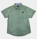Green shirt on a light gray background